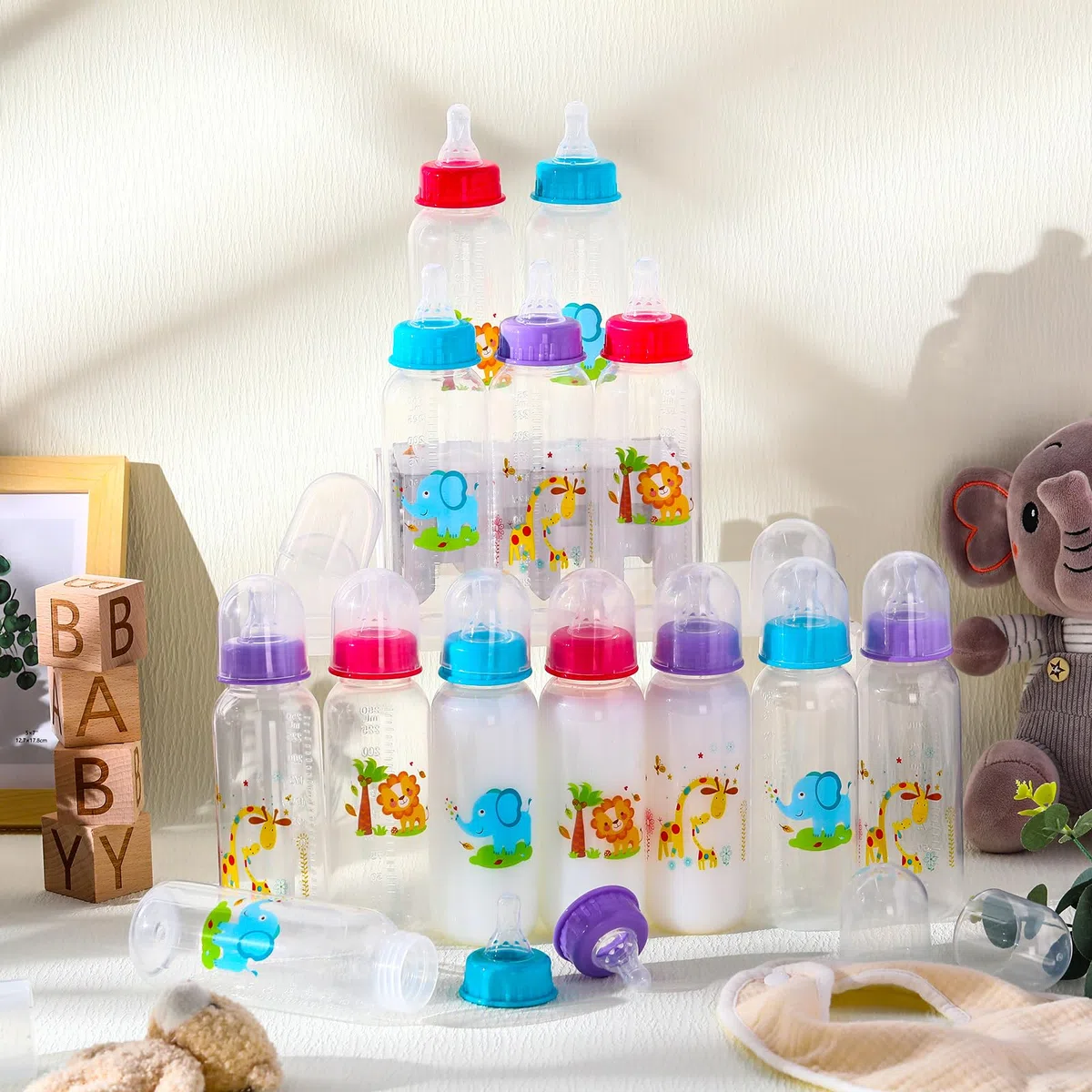 Norme 24 botellas de plástico de 9.5 onzas para baby shower, juegos, fiestas, botellas de leche para niños, decoraciones de cumpleaños, regalos, elefante, león, jirafa (recto)