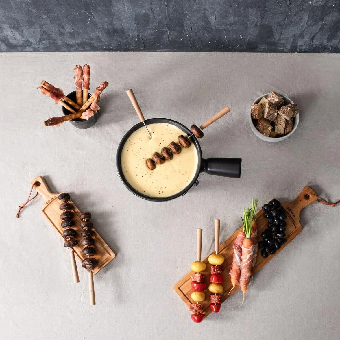 Boska Set de fondue Nero - Cacerola para fondue con 6 tenedores de fondue - Base de hierro fundido - Apta para el lavavajillas - Negro - 1L