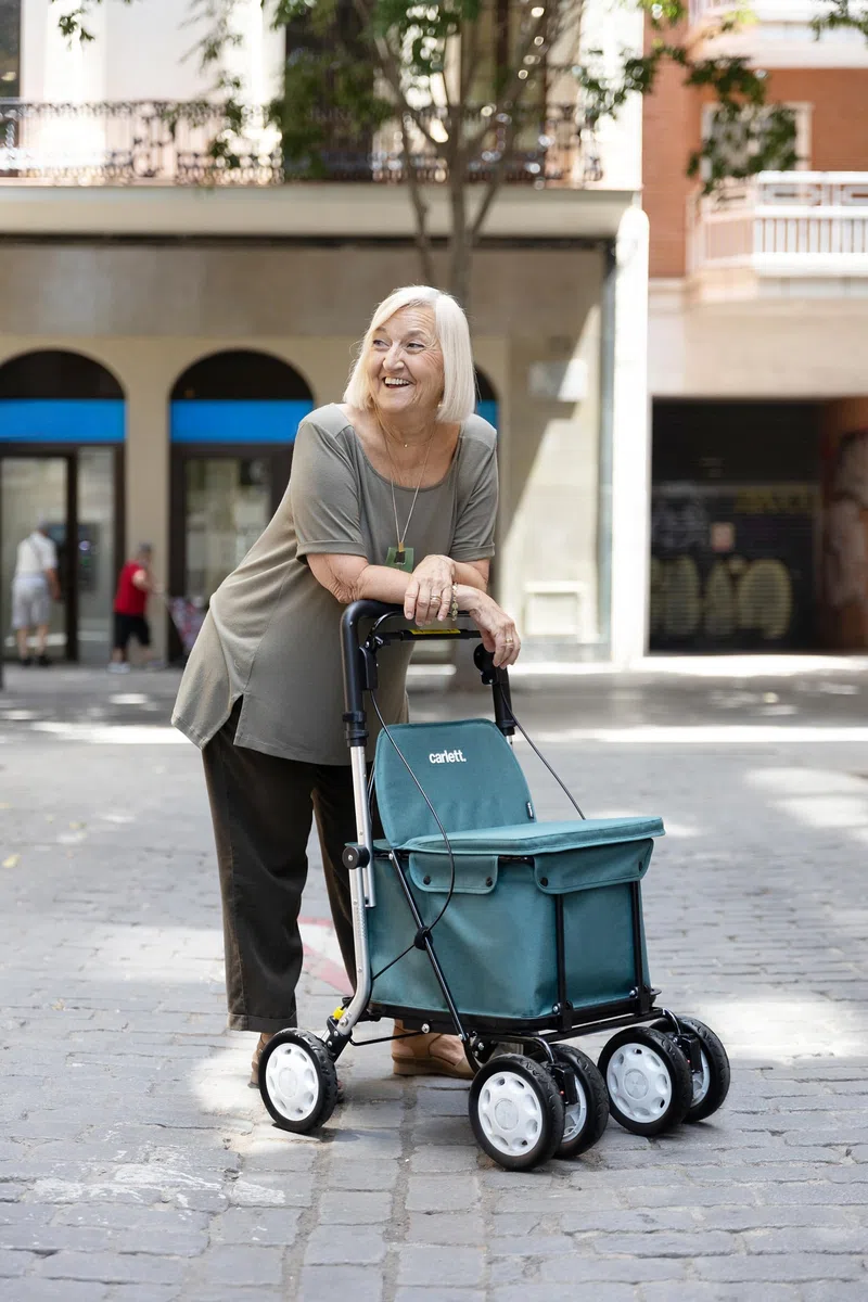 Carlett Andador y Carrito con Asiento Incorporado, Producto Médico Homologado EU, Manillar Regulable, Freno de Parking y Ruedas Ajustables 3 Posiciones, Robusto, Comfort Assist, Gris Claro